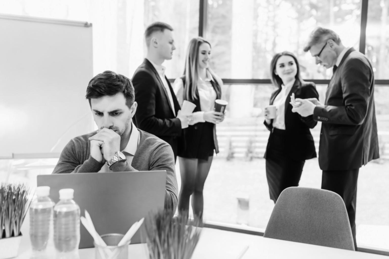 Finance professional reviewing budget approval documentation and workflow charts